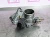 Throttle body from a Toyota Avensis Wagon (T25/B1E) 2.0 16V D-4D 2007