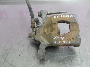 Używane Zacisk hamulcowy prawy tyl Nissan Qashqai (J10) 2.0 dCi Cena € 39,99 Procedura marży oferowane przez Autodemontage Aandijk