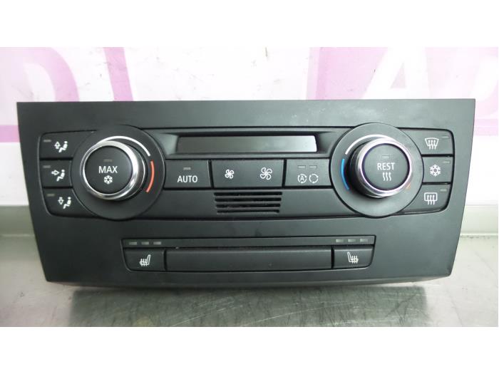 Panel de control de aire acondicionado de un BMW 3 serie (E92) 325d 24V 2009