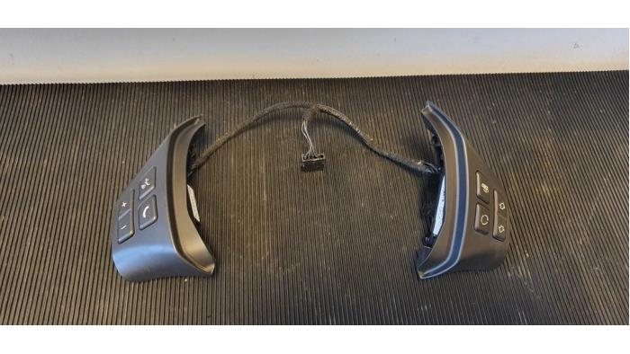 Steering wheel mounted radio control from a BMW 3 serie Touring (E91) 318d 16V 2008