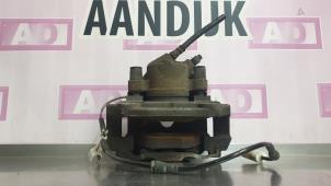 Used Front brake calliper, left BMW X1 (E84) sDrive 20d 2.0 16V Price € 49,99 Margin scheme offered by Autodemontage Aandijk