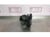Thermostat housing from a Seat Ibiza IV SC (6J1) 1.2 12V 2014