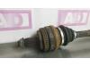 Drive shaft, rear left from a BMW 3 serie (E90) 320d 16V 2010