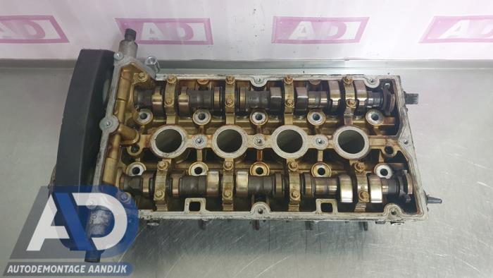 Cylinder head Opel Astra J 1.6 16V Ecotec - 55559340 A16XER