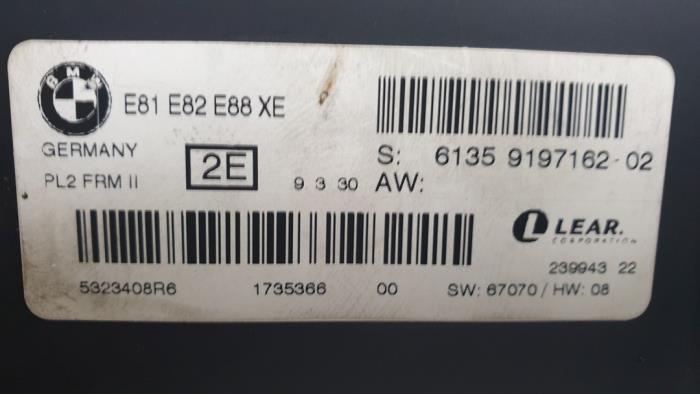 Computer lighting module from a BMW 1 serie (E88) 120i 16V 2010
