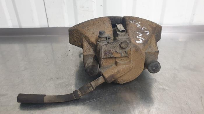 Front brake calliper, left from a Volkswagen Transporter T5 1.9 TDi 2007
