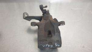 Used Rear brake calliper, left Mazda CX-5 (KE,GH) 2.2 SkyActiv-D 16V 2WD Price € 39,99 Margin scheme offered by Autodemontage Aandijk