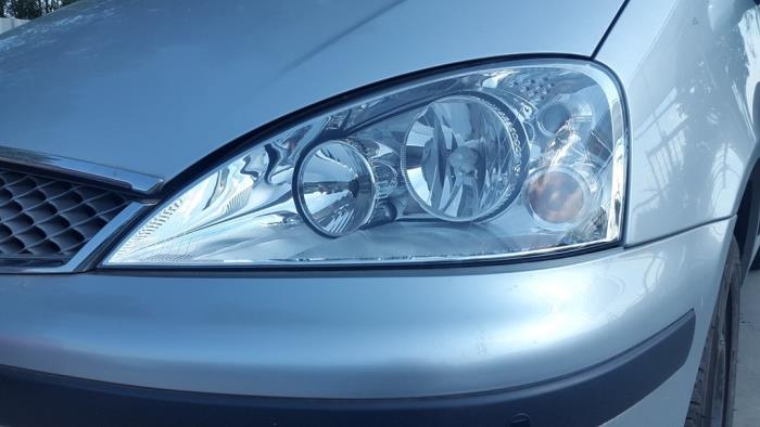 Headlight, left from a Ford Galaxy (WGR) 1.9 TDI 2005