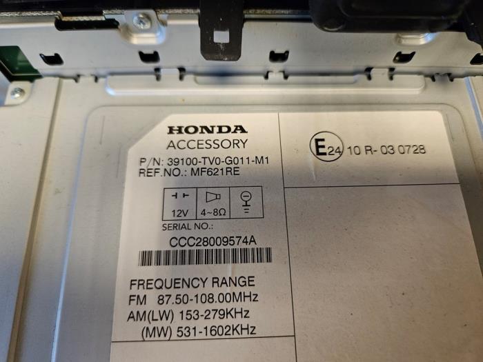 Reproductor de CD y radio de un Honda Civic (FK1/2/3) 1.4i VTEC 16V 2013