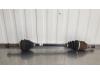 Front drive shaft, left from a Toyota Yaris II (P9) 1.3 16V VVT-i 2008