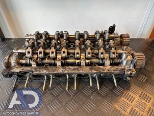 Used Cylinder head Renault Laguna II Grandtour (KG) 2.2 dCi 150 16V Price on request offered by Autodemontage Aandijk