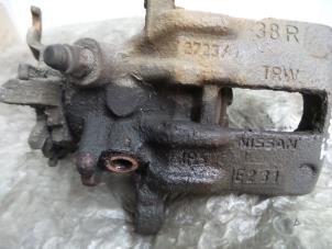Used Rear brake calliper, right Nissan Almera Tino Price on request offered by Autodemontage Aandijk
