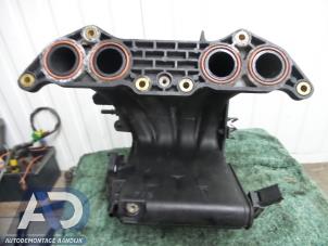 Ansaugbrugge van een Peugeot 306 (7A/C/S) 1.4 2000