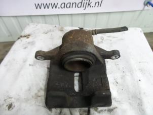 Used Front brake calliper, right Kia Sportage (JE) 2.0 CRDi 16V VGT 4x2 Price € 44,99 Margin scheme offered by Autodemontage Aandijk
