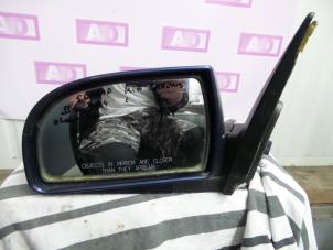 Used Wing mirror, left Kia Carens II (FJ) 2.0 CRDI 16V Price € 39,99 Margin scheme offered by Autodemontage Aandijk