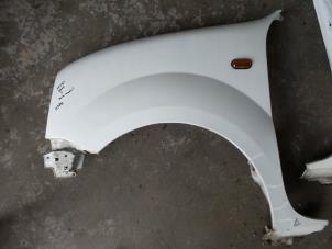 Used Front wing, left Renault Kangoo Price on request offered by Autodemontage Aandijk
