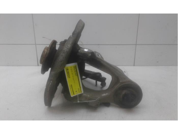 Knuckle, rear left from a BMW X6 (F16) xDrive30d 3.0 24V 2015