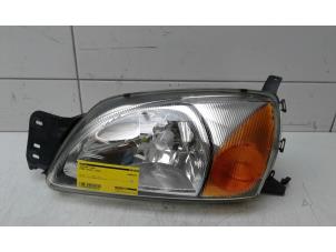 Used Headlight, left Ford Fiesta 4 Price € 55,00 Margin scheme offered by Autobedrijf G.H. Wessel B.V.