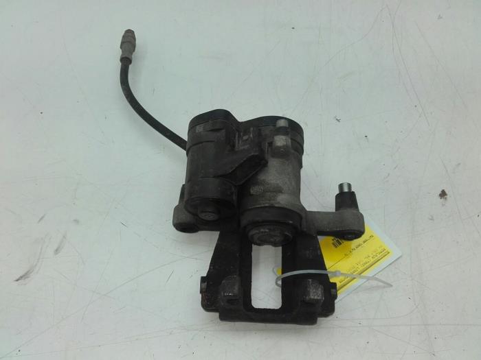 Rear brake calliper, left from a Volkswagen Golf VIII (CD1) 1.5 eTSI 16V 2020