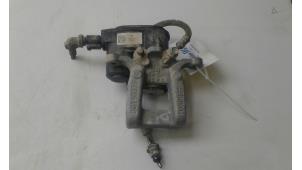 Used Rear brake calliper, left Kia Sportage (QL) 1.6 T-GDI 16V 4x2 Price € 149,00 Margin scheme offered by Autobedrijf G.H. Wessel B.V.