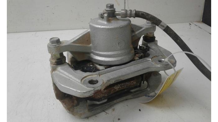 Front brake calliper, right from a Kia Ceed (CDB5/CDBB) 1.4i 16V 2019