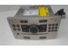 Radio CD player from a Opel Astra H SW (L35) 1.7 CDTi 16V 2008