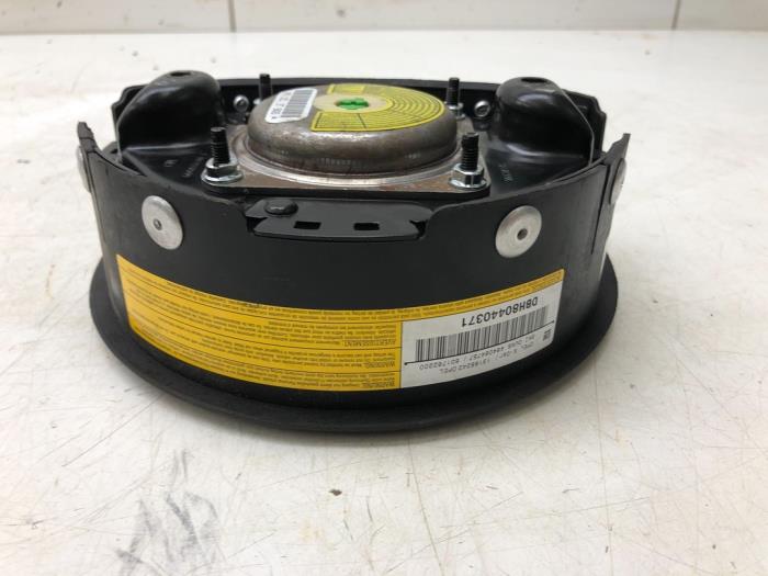 Left airbag (steering wheel) from a Vauxhall Combo Mk.II (Corsa) 1.3 CDTI 16V 2008