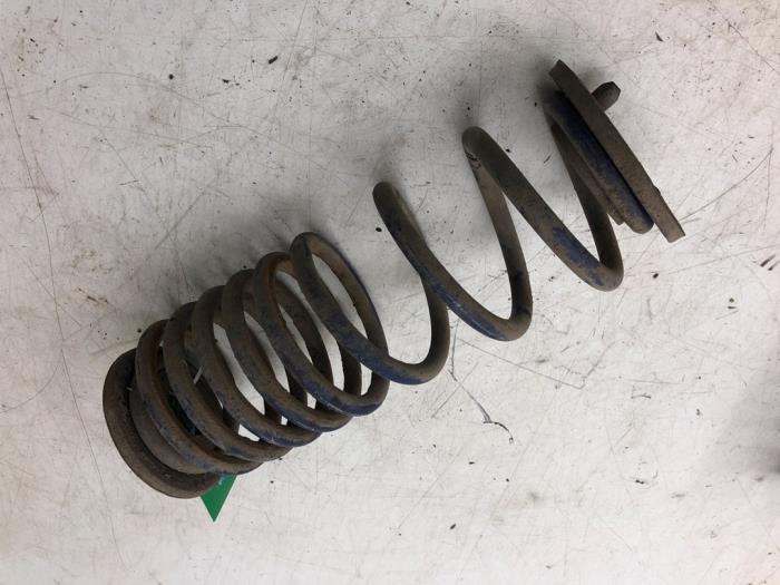 Rear coil spring from a Volkswagen Scirocco (137/13AD) 2.0 TDI 16V 2012
