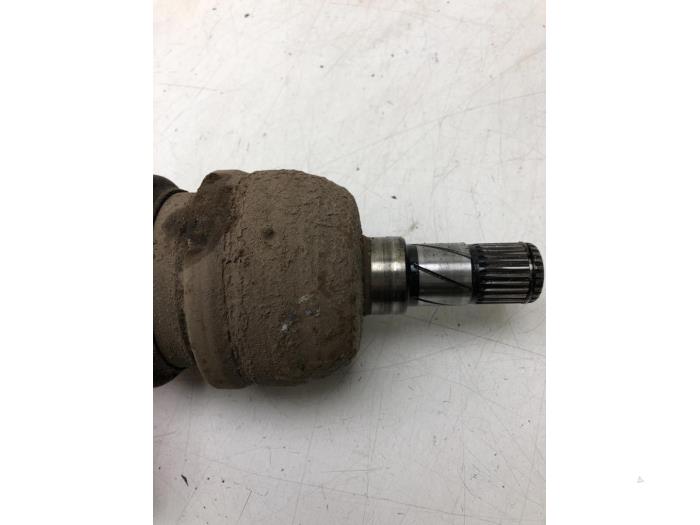 Front drive shaft, left from a Opel Zafira (M75) 1.7 CDTi 16V 2009