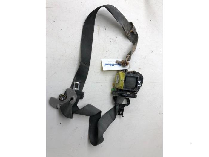 Seatbelt tensioner, left from a Kia Ceed (CDB5/CDBB) 1.4i 16V 2019