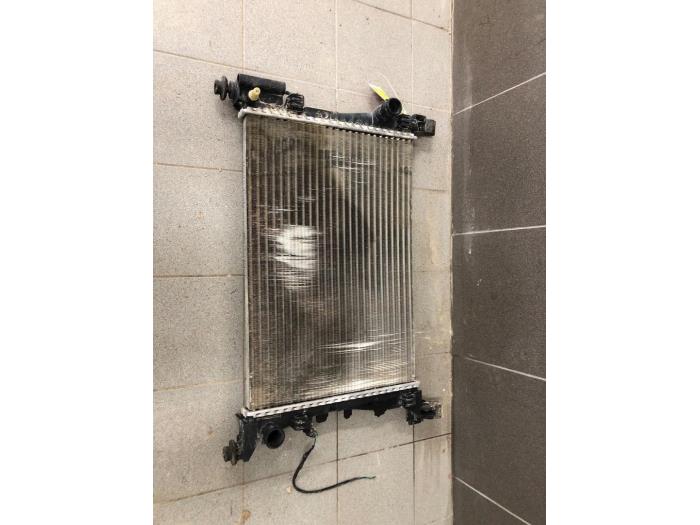 Used Radiator Opel Corsa E 1.4 16V Price € 51,45 Margin scheme offered by Wessel Parts & Service B.V.