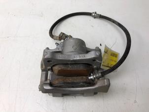 Used Front brake calliper, left Nissan Micra (K14) 1.0 IG-T 100 Price € 69,00 Margin scheme offered by Autobedrijf G.H. Wessel B.V.