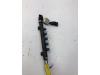 Fuel injector nozzle from a Opel Astra Mk.7, 2015 1.6 CDTI 16V, Hatchback, 4-dr, Diesel, 1.598cc, 81kW (110pk), FWD, B16DTE; B16DTU, 2015-07 2017