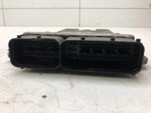 Engine management computer from a Volkswagen Golf V (1K1) 2.0 TDI DPF 2008