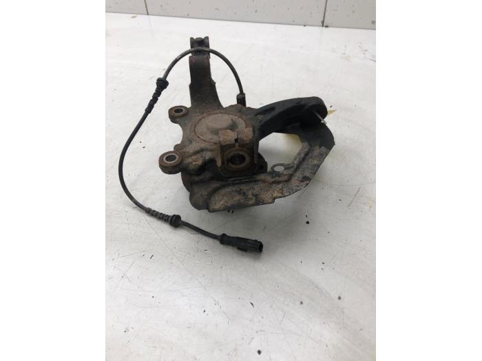 Knuckle, front left from a Renault Twingo III (AH) 0.9 Energy TCE 93 12V 2019