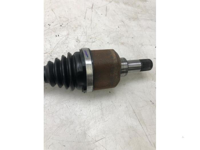 Front drive shaft, left from a Opel Crossland/Crossland X 1.2 Turbo 12V 2021