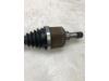 Front drive shaft, left from a Opel Crossland/Crossland X 1.2 Turbo 12V 2021