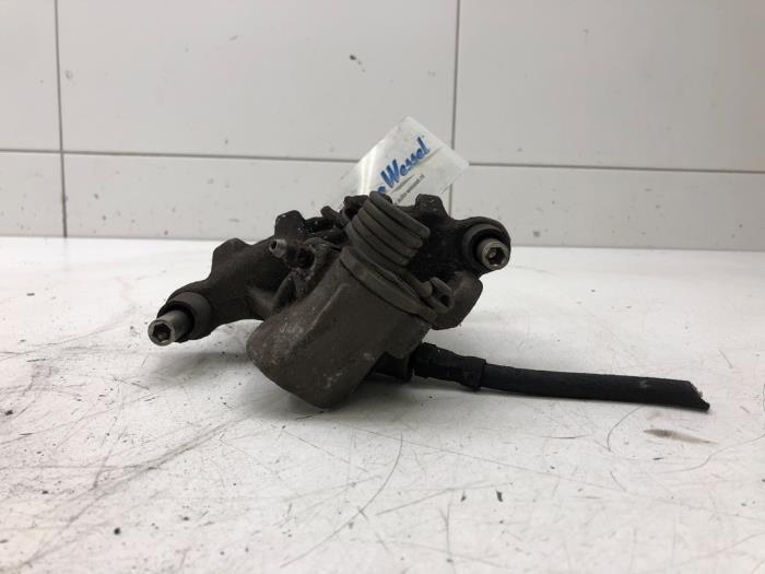 Rear brake calliper, left from a Volvo V40 (MV) 1.6 T2 GTDi 16V 2014