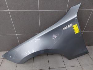 Used Front wing, left BMW 1 serie (E81) 118i 16V Price € 89,00 Margin scheme offered by Autobedrijf G.H. Wessel B.V.