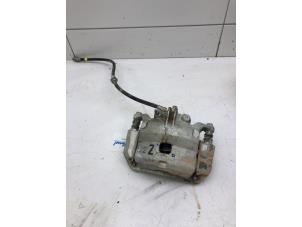 Used Front brake calliper, right Nissan NV 200 (M20M) 1.5 dCi 90 Price € 79,00 Margin scheme offered by Autobedrijf G.H. Wessel B.V.