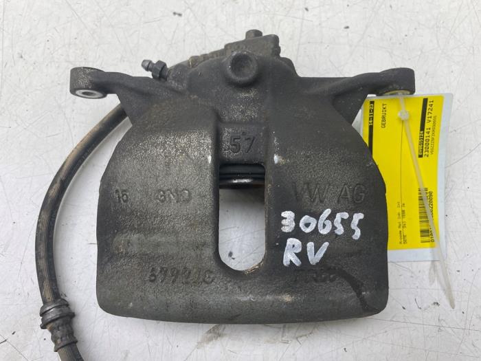 Front brake calliper, right from a Seat Leon (5FB) 1.6 TDI 16V 2019