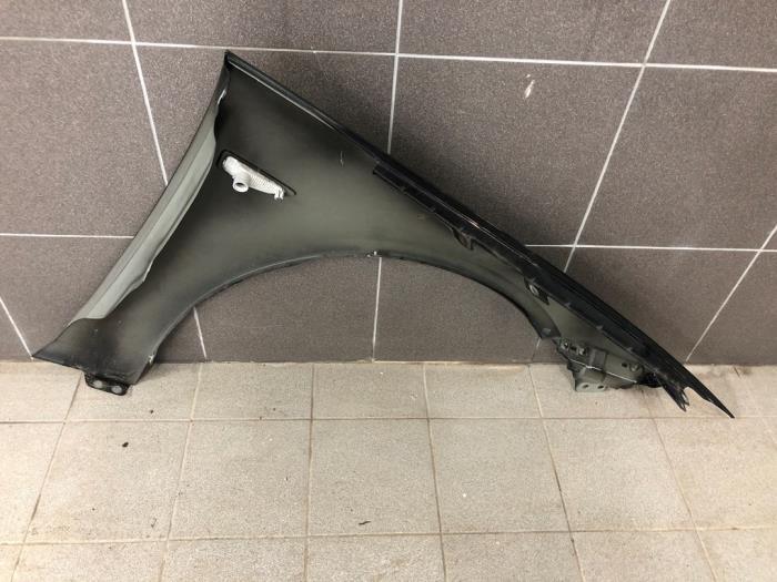 Front wing, left from a Opel Insignia Sports Tourer 2.0 CDTI 16V 2020