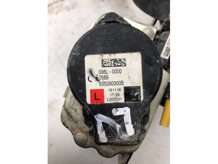 Seatbelt tensioner, left from a Kia Sportage (QL) 1.6 GDI 16V 4x2 2019