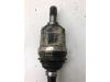 Front drive shaft, left from a Kia Sportage (QL) 1.6 GDI 132 16V 4x2 2019