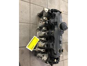 Topplock från en Mercedes-Benz A (W176) 1.5 A-180 CDI, A-180d 16V 2012