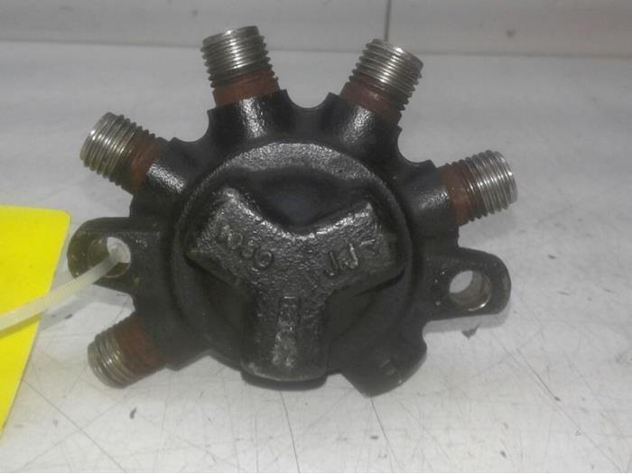 Injector housing from a Renault Megane II (LM) 1.5 dCi 80 2002