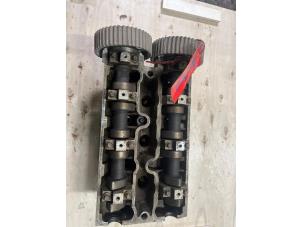 Used Cylinder head Opel Omega B Caravan (21/22/23) 3.0i V6 24V Price on request offered by Autobedrijf G.H. Wessel B.V.