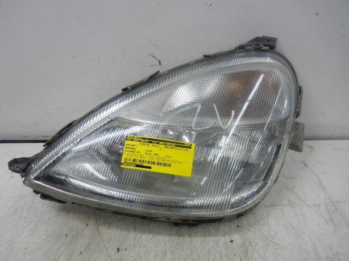 Używane Reflektor lewy Mercedes A (W168) 1.6 A-160 Cena € 51,45 Procedura marży oferowane przez Wessel Parts & Service B.V.