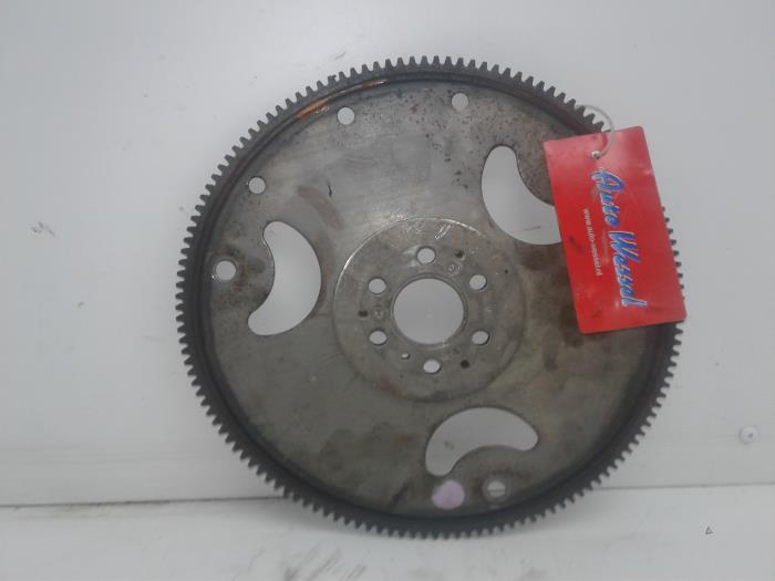 Starter ring gear from a Opel Astra J (PD5/PE5) 1.4 Turbo 16V 2013