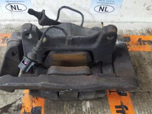 Used Front brake calliper, left Volkswagen Passat Price € 100,00 Margin scheme offered by De Witte Boerderij B.V.